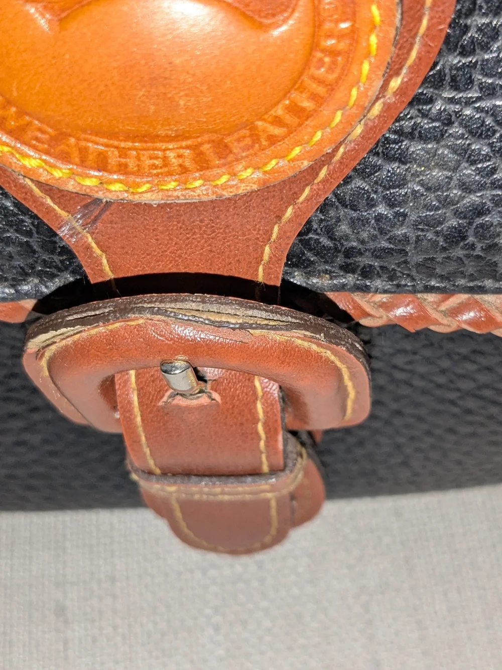 Dooney & Bourke Black Pebbled Leather Briefcase with Brown Trim